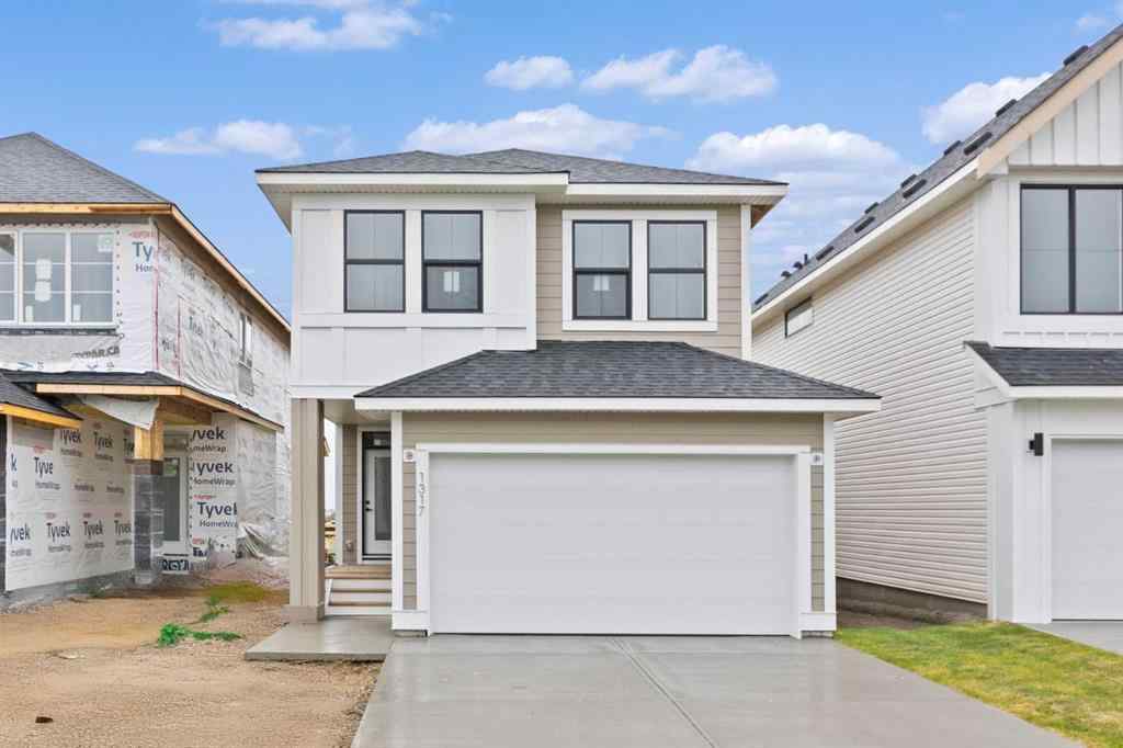 MLS® A2239089 - 1317 South Point Parade SW in South Point Airdrie, Residential