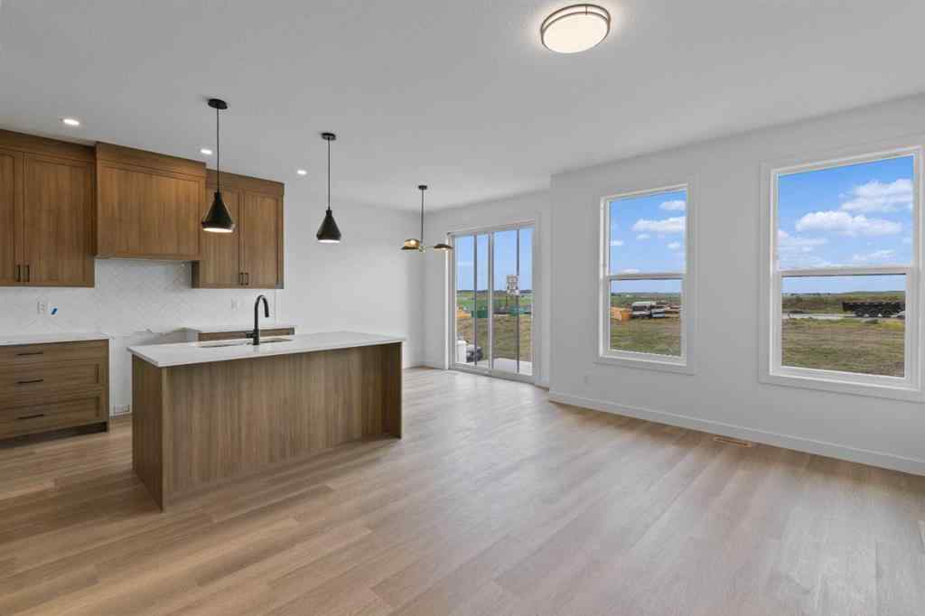 MLS® A2239089 - 1317 South Point Parade SW in South Point Airdrie, Residential