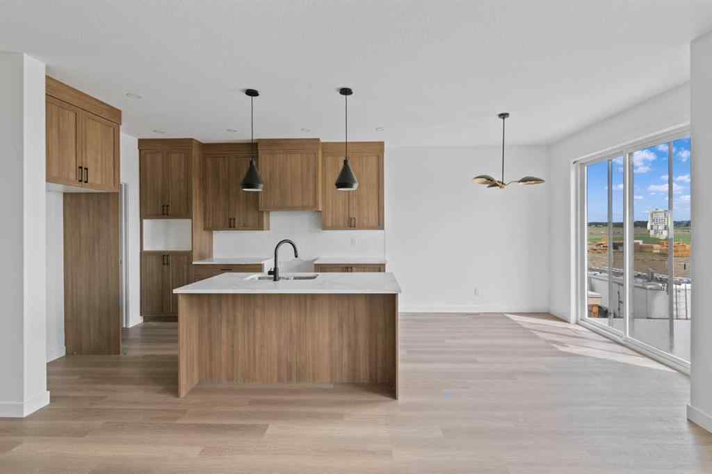 MLS® A2239089 - 1317 South Point Parade SW in South Point Airdrie, Residential