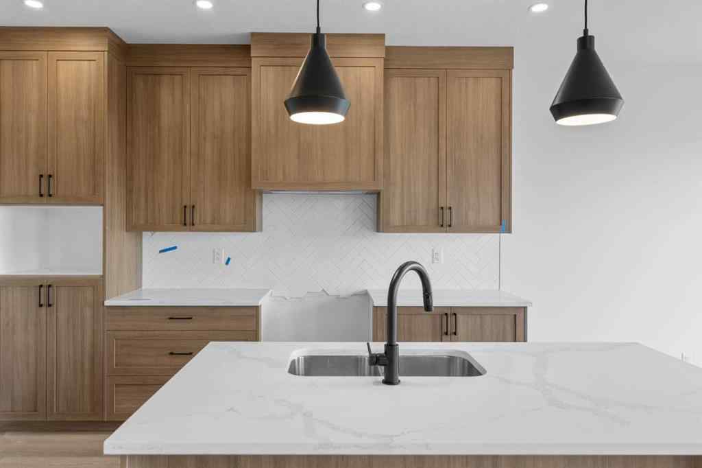MLS® A2239089 - 1317 South Point Parade SW in South Point Airdrie, Residential