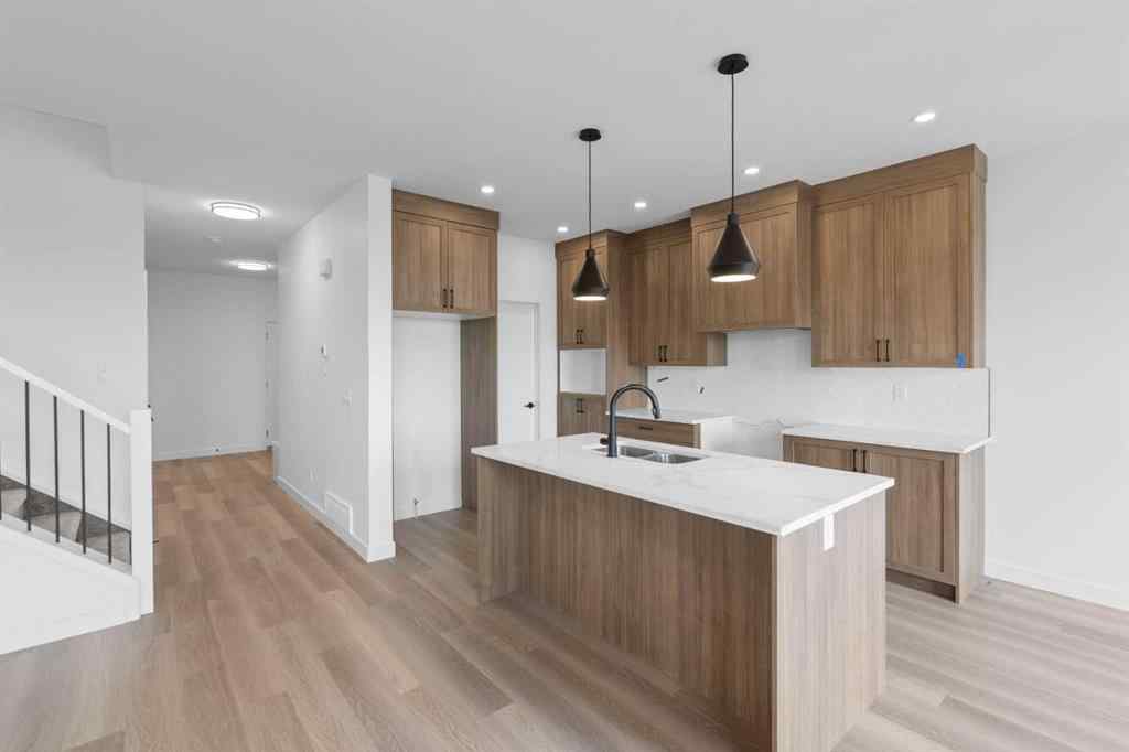 MLS® A2239089 - 1317 South Point Parade SW in South Point Airdrie, Residential