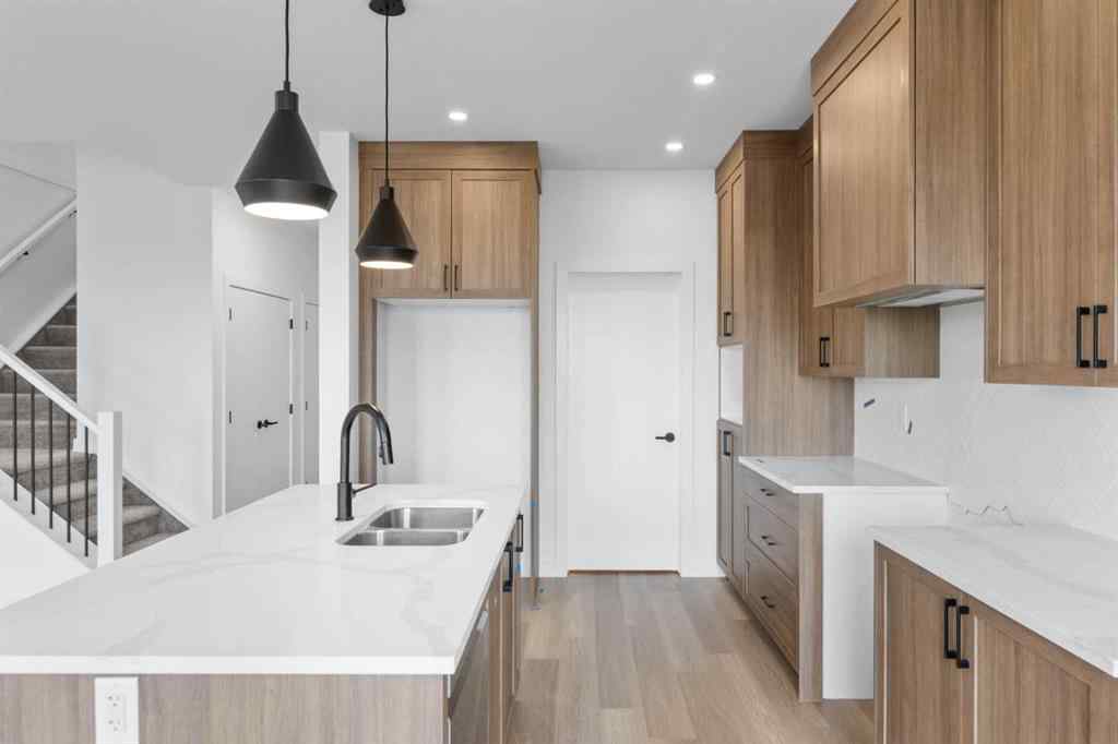 MLS® A2239089 - 1317 South Point Parade SW in South Point Airdrie, Residential