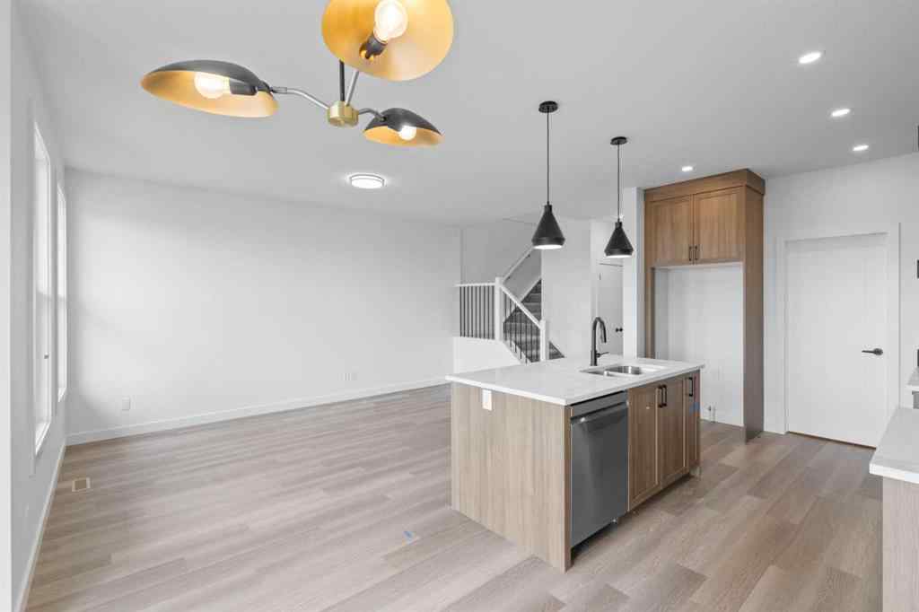 MLS® A2239089 - 1317 South Point Parade SW in South Point Airdrie, Residential