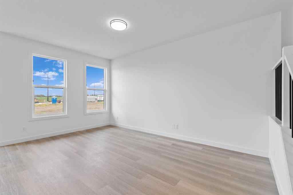 MLS® A2239089 - 1317 South Point Parade SW in South Point Airdrie, Residential