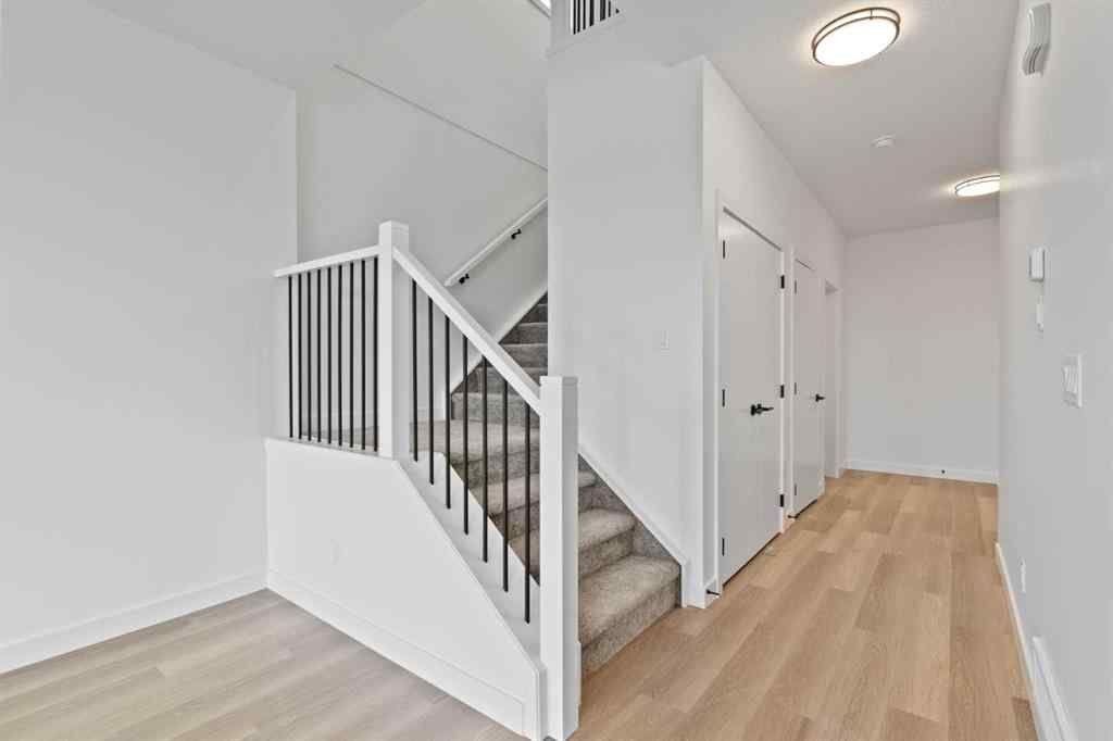 MLS® A2239089 - 1317 South Point Parade SW in South Point Airdrie, Residential