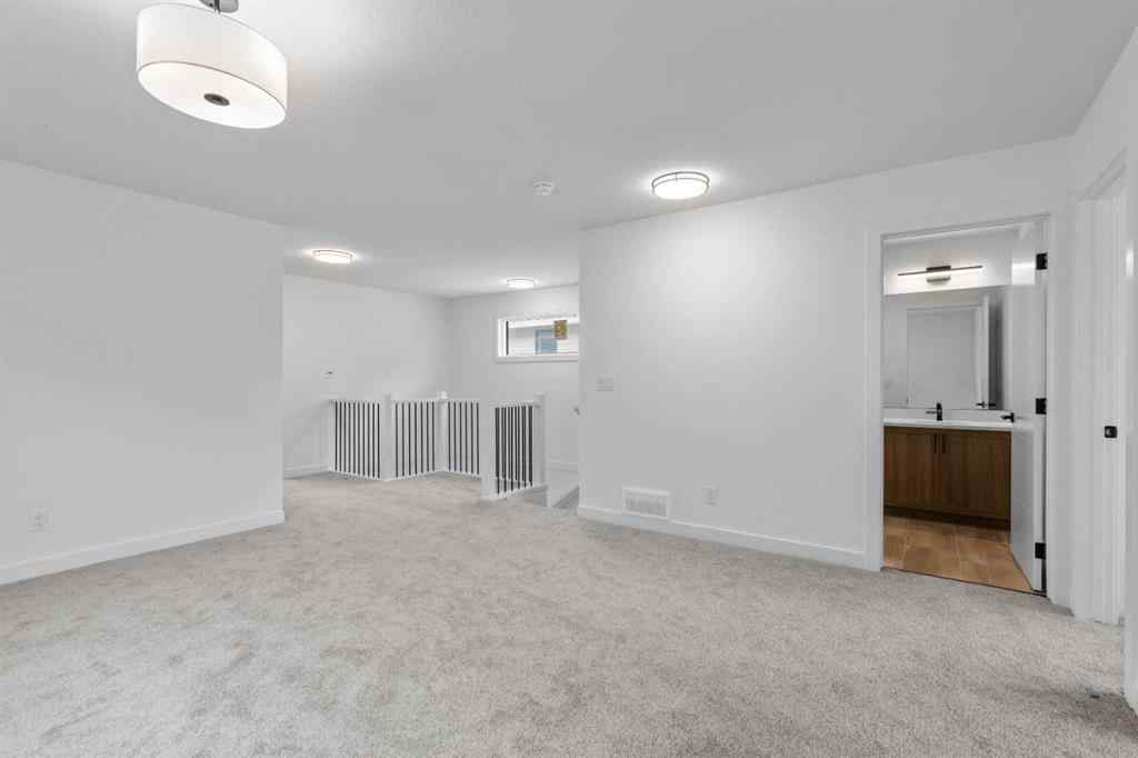 MLS® A2239089 - 1317 South Point Parade SW in South Point Airdrie, Residential