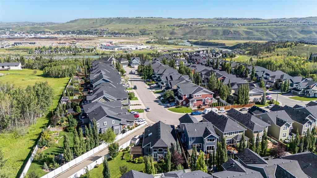 MLS® A2239120 - 68 Ridge View Close  in River Song Cochrane, Residential
