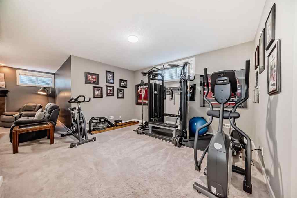 MLS® A2239120 - 68 Ridge View Close  in River Song Cochrane, Residential