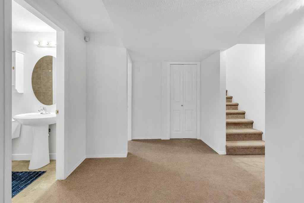 MLS® A2239177 - 720 Luxstone Square SW in Luxstone Airdrie, Residential