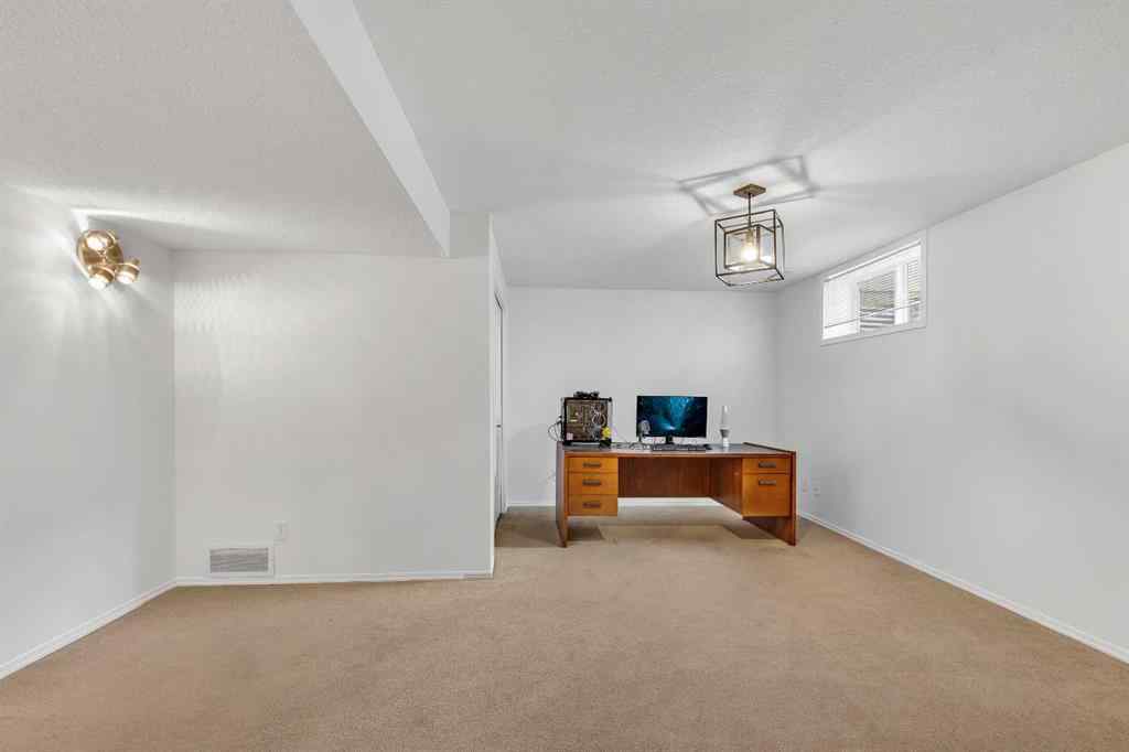 MLS® A2239177 - 720 Luxstone Square SW in Luxstone Airdrie, Residential
