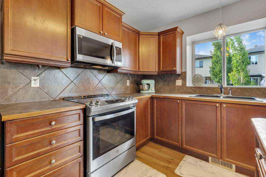 MLS® A2239177 - 720 Luxstone Square SW in Luxstone Airdrie, Residential