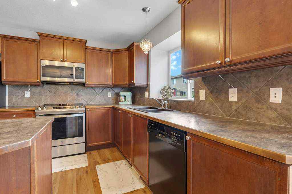 MLS® A2239177 - 720 Luxstone Square SW in Luxstone Airdrie, Residential