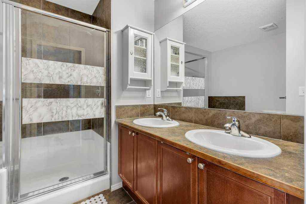 MLS® A2239177 - 720 Luxstone Square SW in Luxstone Airdrie, Residential