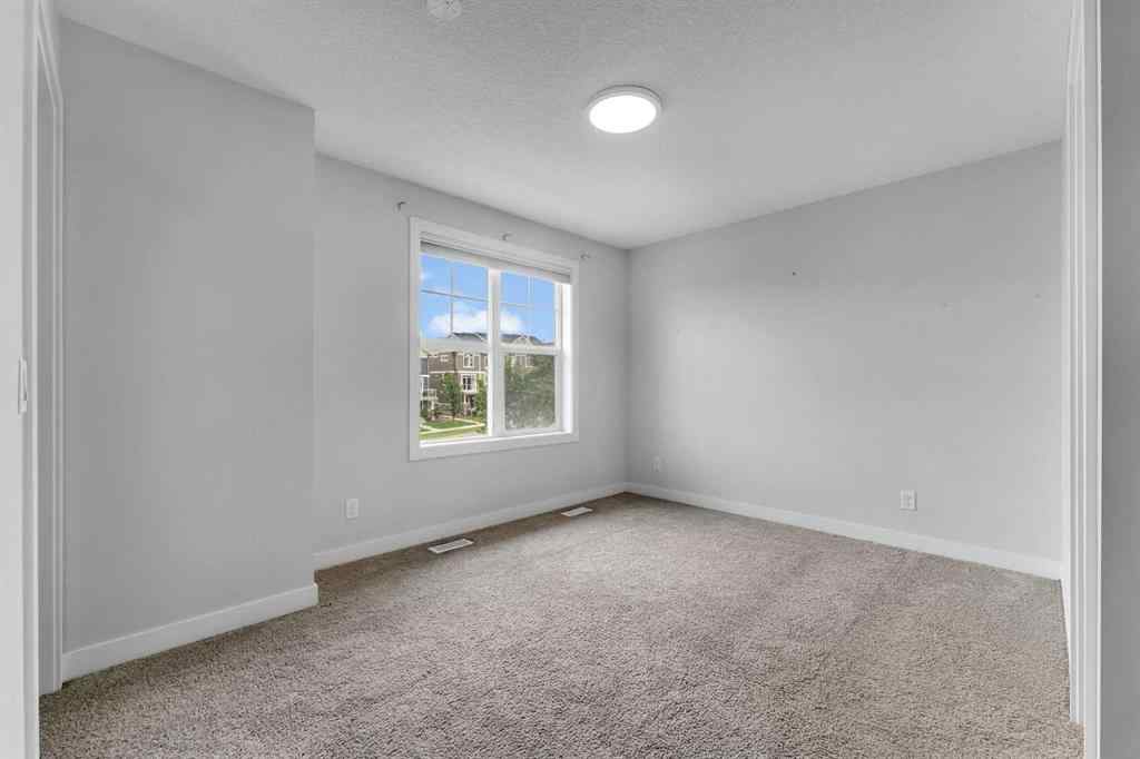 MLS® A2239207 - 131 Evanscrest Gardens NW in Evanston Calgary, Residential