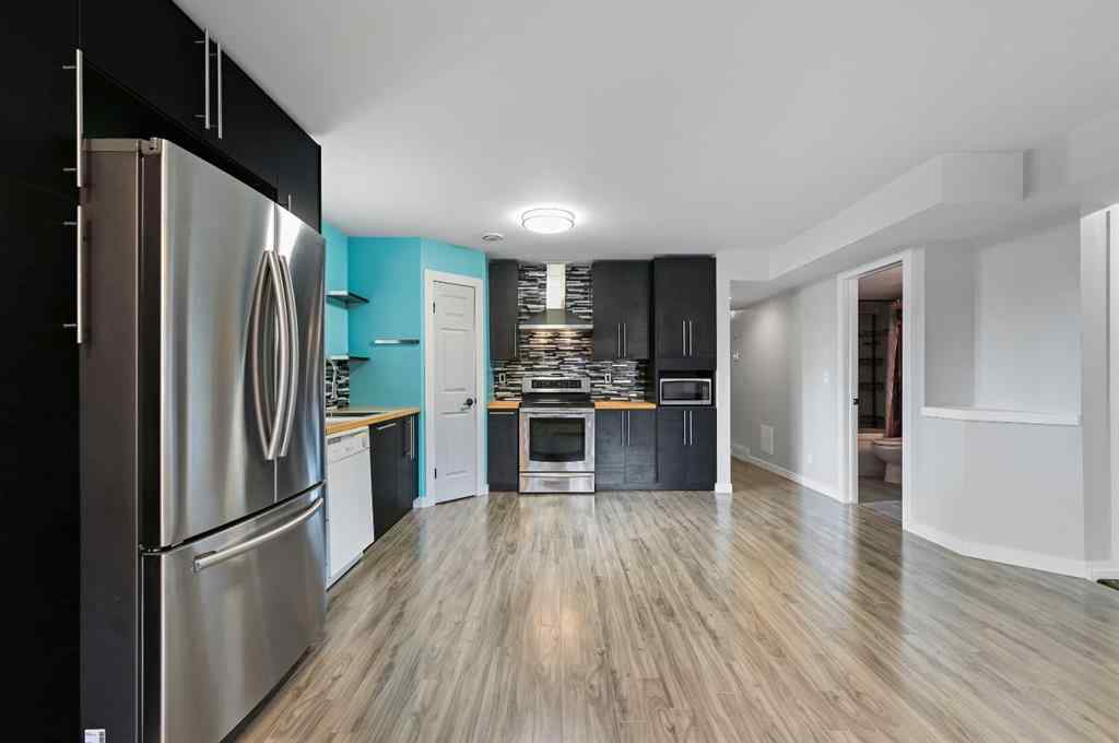 MLS® A2239232 - Unit #201 1723 37 Street SE in Forest Lawn Calgary, Residential