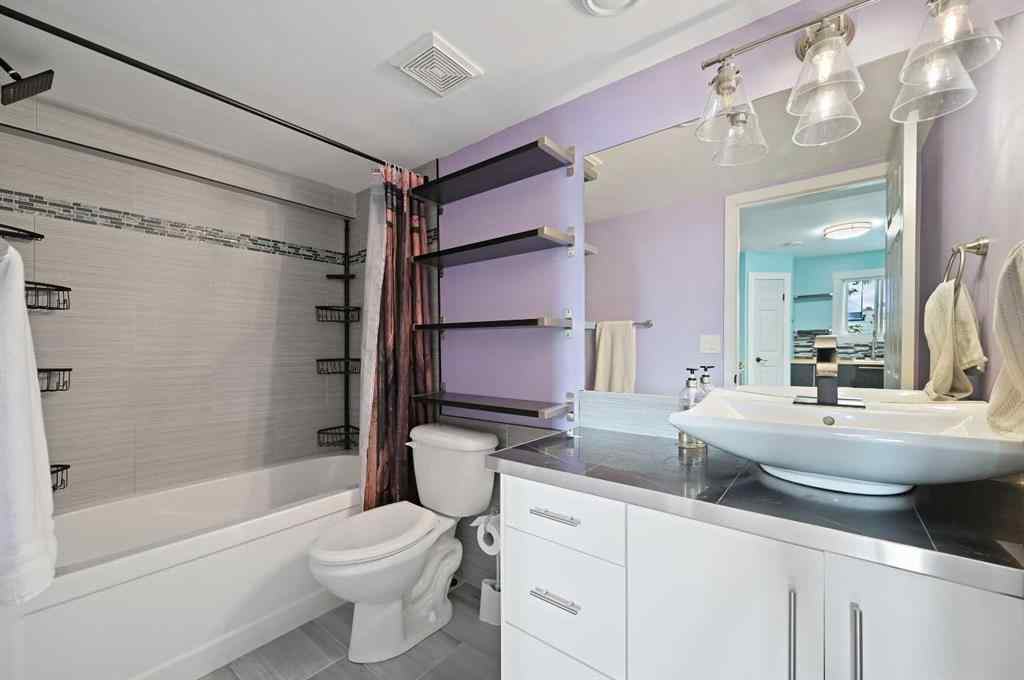 MLS® A2239232 - Unit #201 1723 37 Street SE in Forest Lawn Calgary, Residential