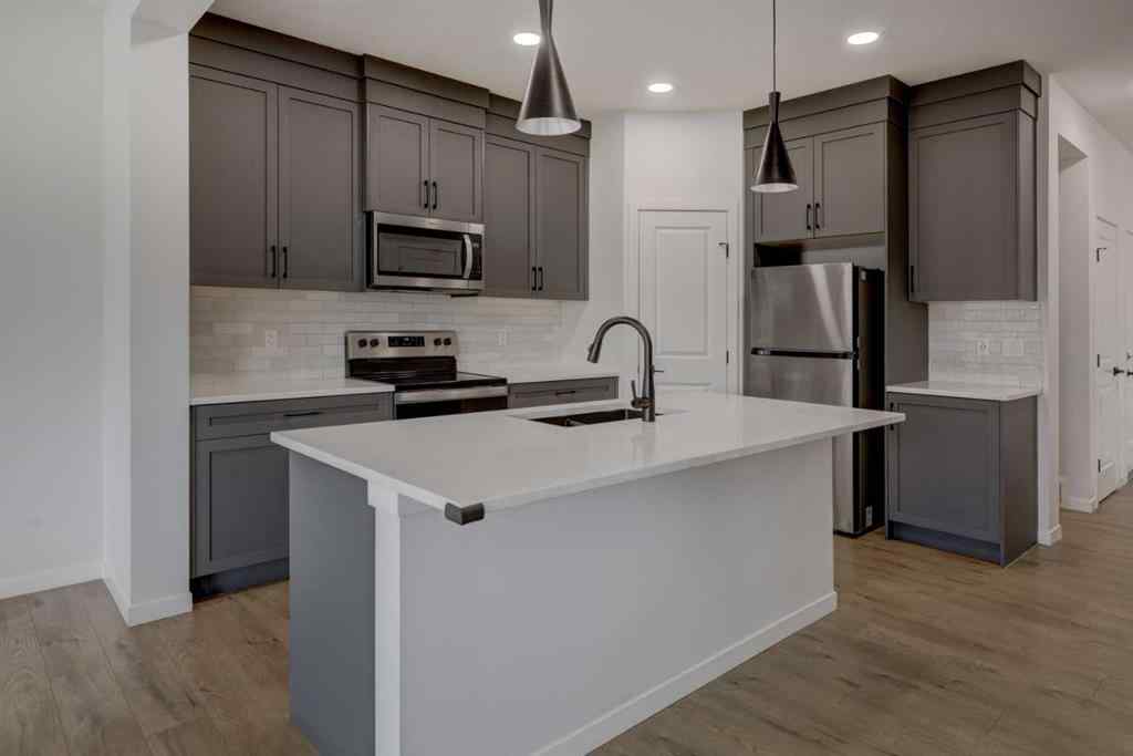 MLS® A2239236 - 1038 Bayview Rise SW in Bayview Airdrie, Residential