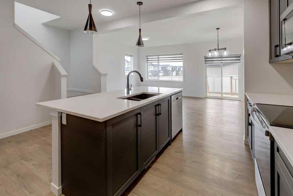 MLS® A2239236 - 1038 Bayview Rise SW in Bayview Airdrie, Residential