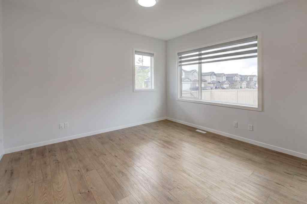 MLS® A2239236 - 1038 Bayview Rise SW in Bayview Airdrie, Residential