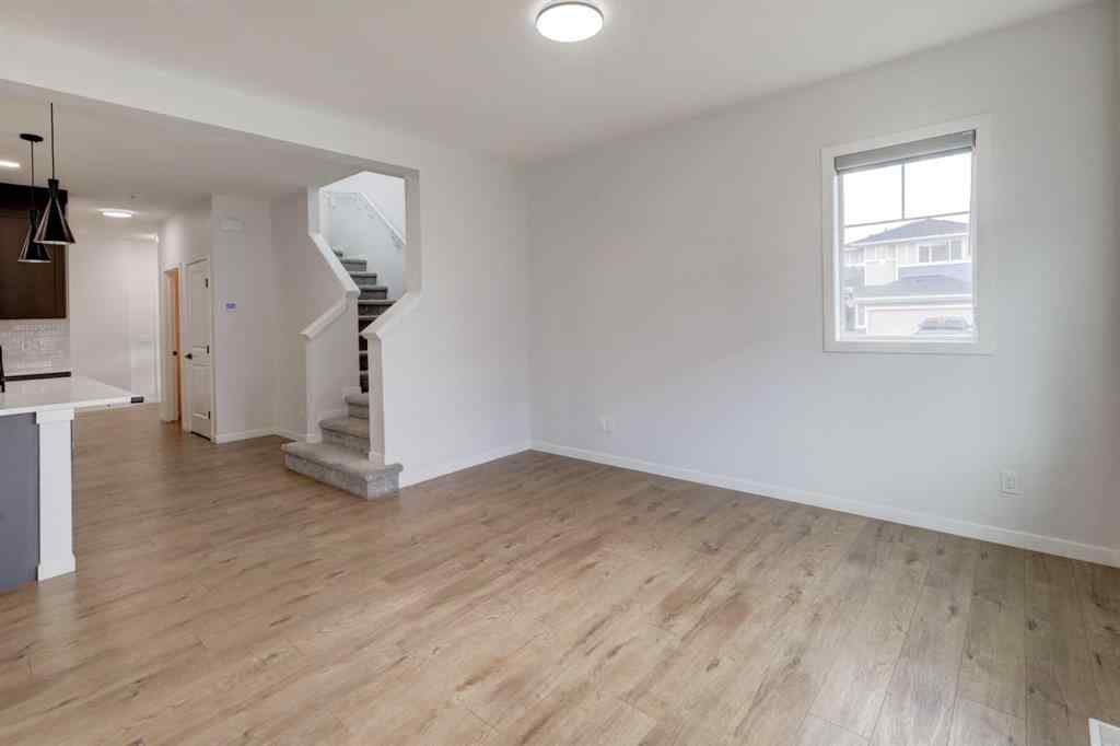 MLS® A2239236 - 1038 Bayview Rise SW in Bayview Airdrie, Residential