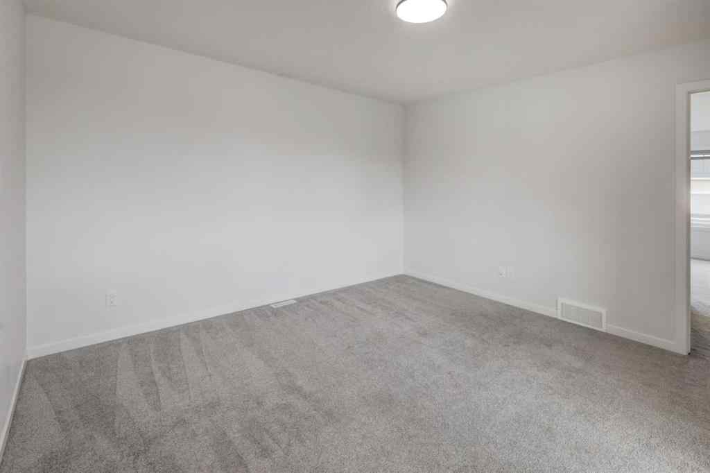 MLS® A2239236 - 1038 Bayview Rise SW in Bayview Airdrie, Residential