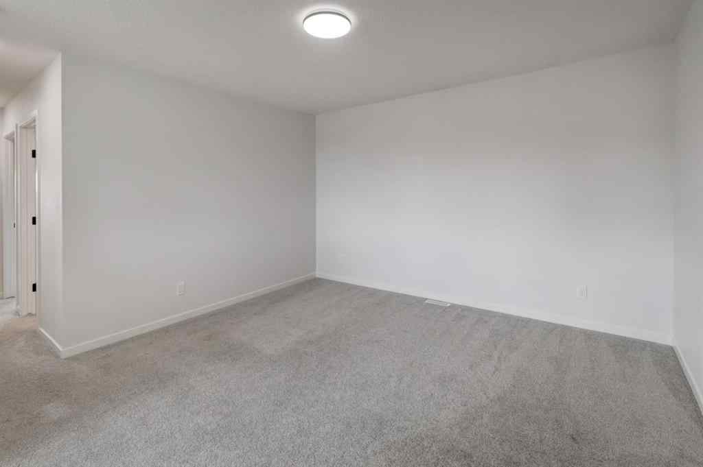 MLS® A2239236 - 1038 Bayview Rise SW in Bayview Airdrie, Residential