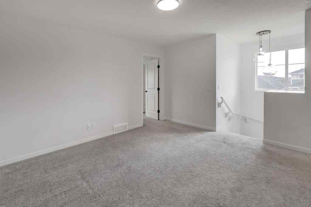MLS® A2239236 - 1038 Bayview Rise SW in Bayview Airdrie, Residential