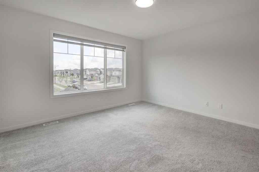MLS® A2239236 - 1038 Bayview Rise SW in Bayview Airdrie, Residential