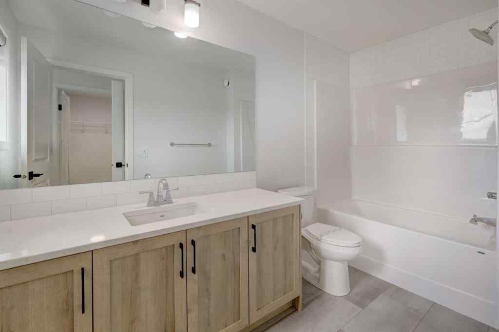 MLS® A2239236 - 1038 Bayview Rise SW in Bayview Airdrie, Residential
