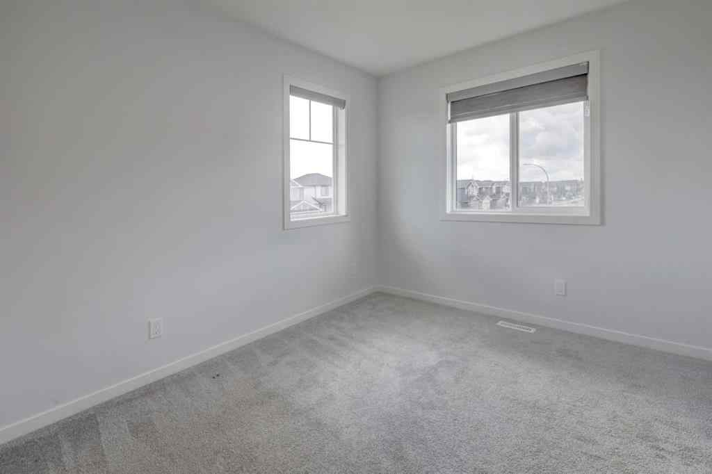 MLS® A2239236 - 1038 Bayview Rise SW in Bayview Airdrie, Residential