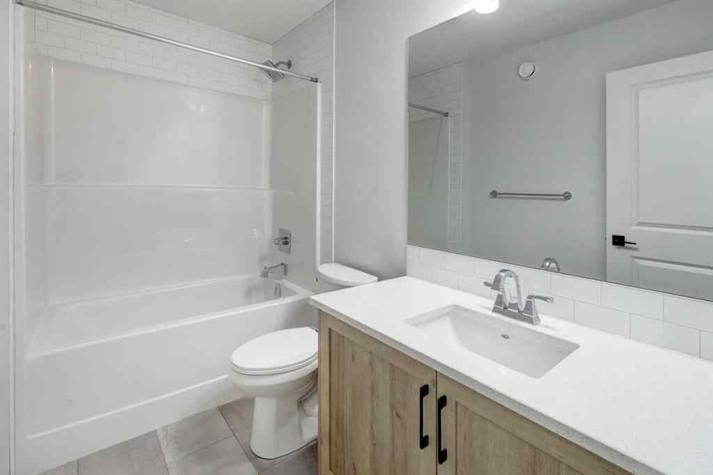 MLS® A2239236 - 1038 Bayview Rise SW in Bayview Airdrie, Residential