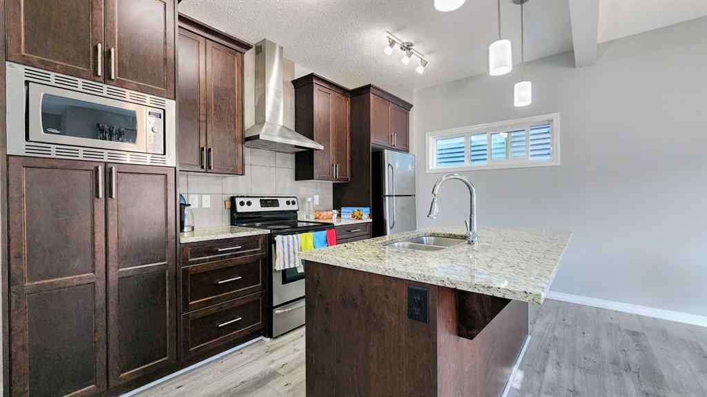 MLS® A2239271 - 121 Walgrove Gardens SE in Walden Calgary, Residential