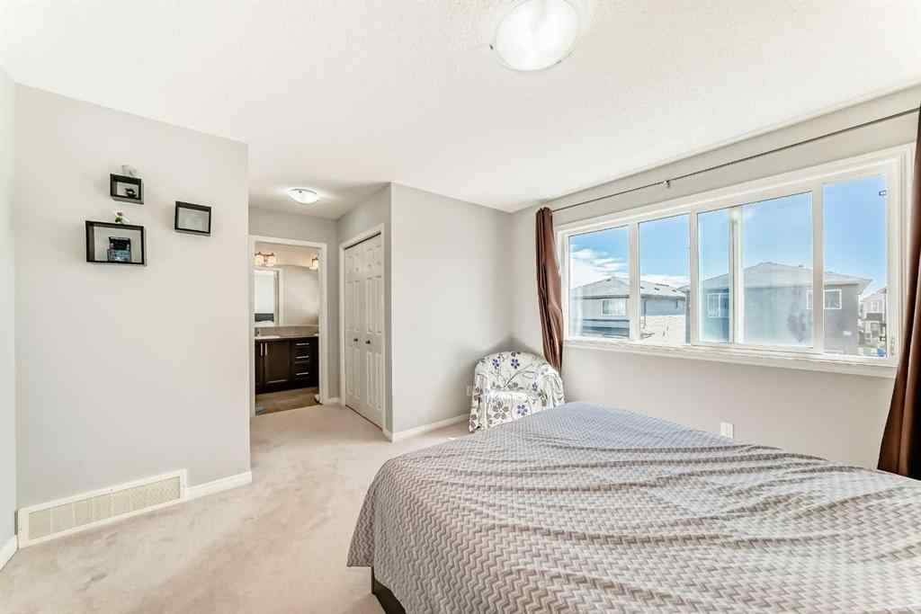 MLS® A2239271 - 121 Walgrove Gardens SE in Walden Calgary, Residential