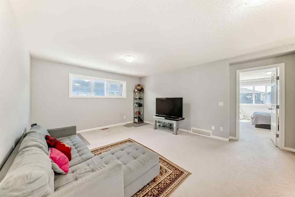 MLS® A2239271 - 121 Walgrove Gardens SE in Walden Calgary, Residential