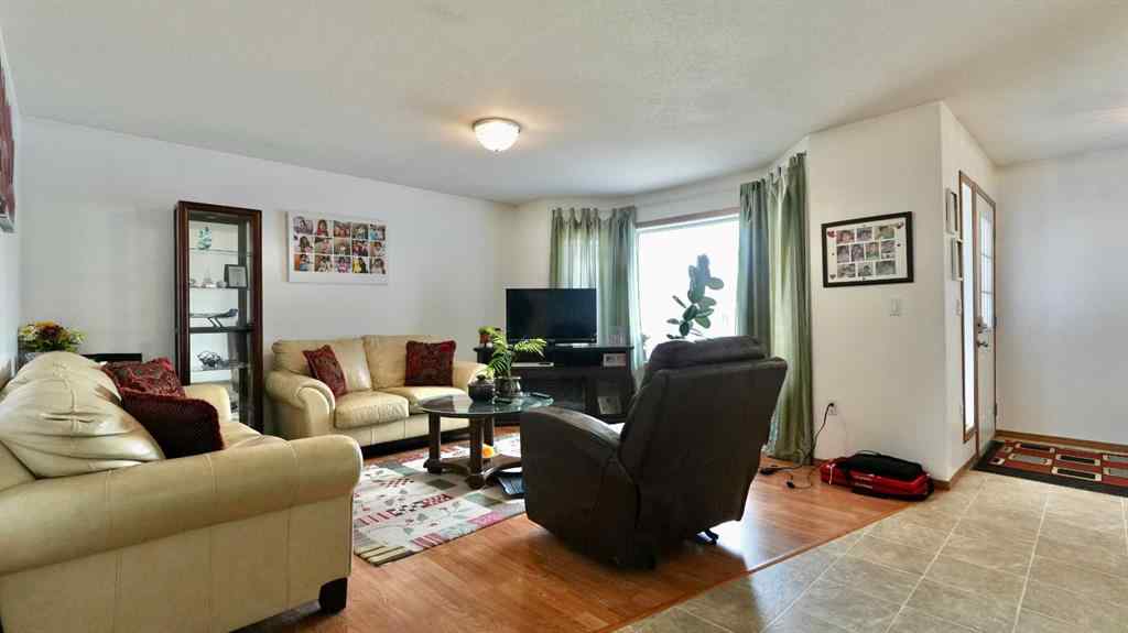 MLS® A2239292 - 10302 83 Street  in Saddleback Ridge Peace River, Residential