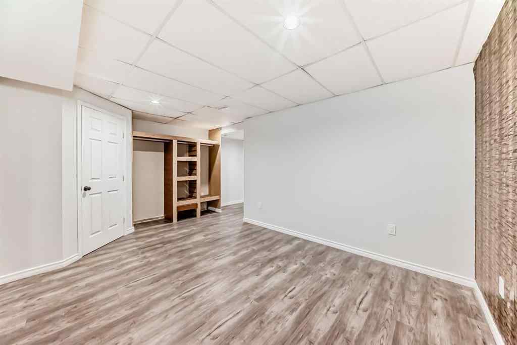 MLS® A2239315 - Unit #100 6103 Madigan Drive NE in Marlborough Park Calgary, Residential