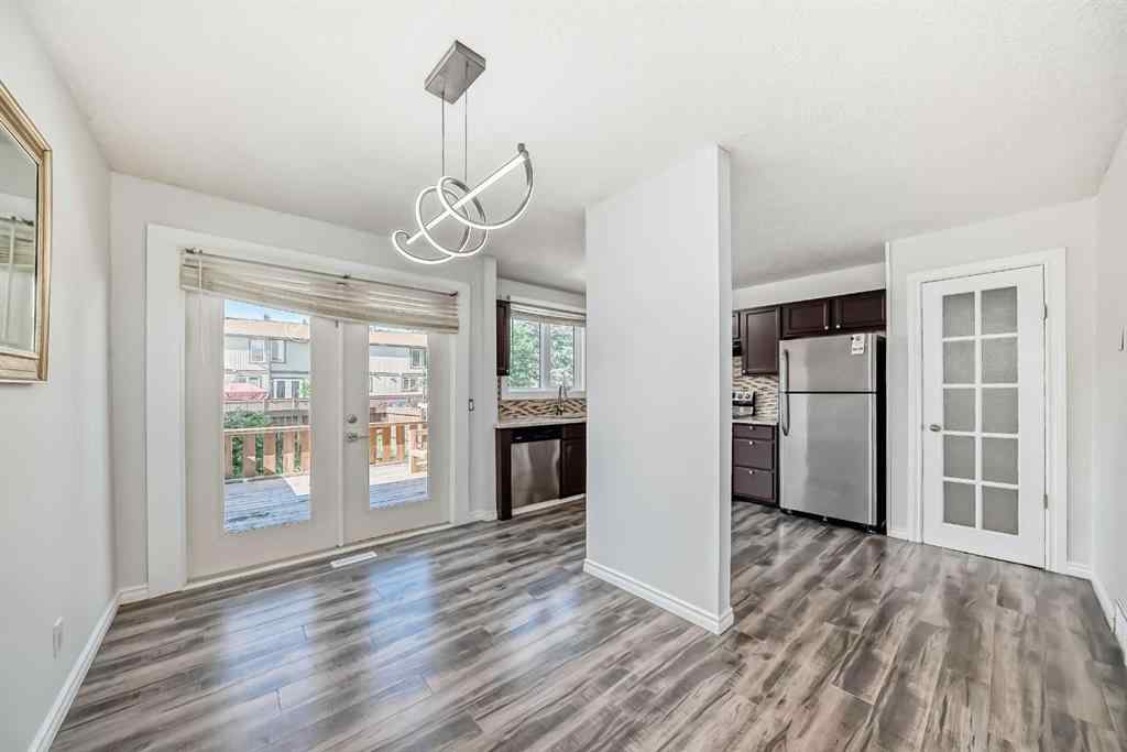 MLS® A2239315 - Unit #100 6103 Madigan Drive NE in Marlborough Park Calgary, Residential