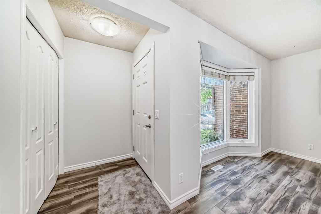 MLS® A2239315 - Unit #100 6103 Madigan Drive NE in Marlborough Park Calgary, Residential