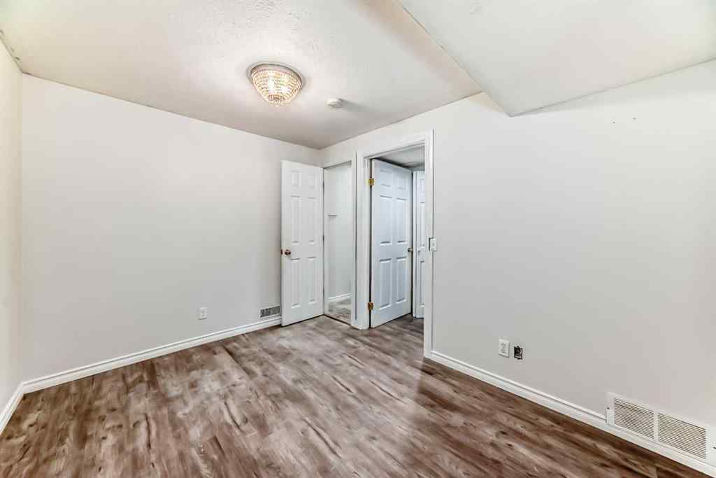 MLS® A2239315 - Unit #100 6103 Madigan Drive NE in Marlborough Park Calgary, Residential