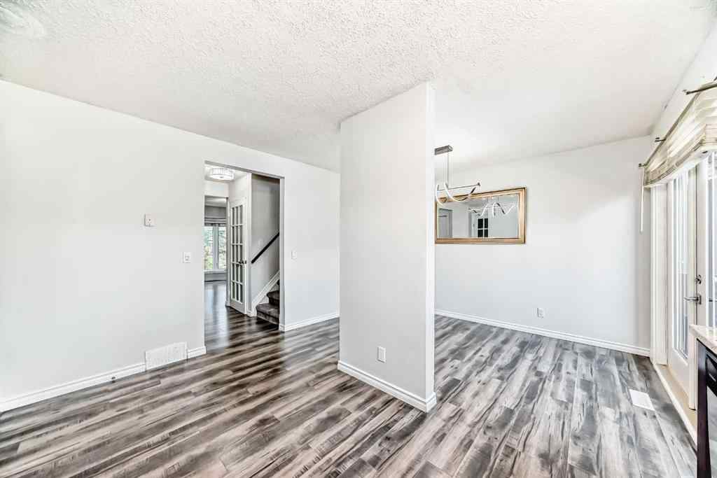 MLS® A2239315 - Unit #100 6103 Madigan Drive NE in Marlborough Park Calgary, Residential