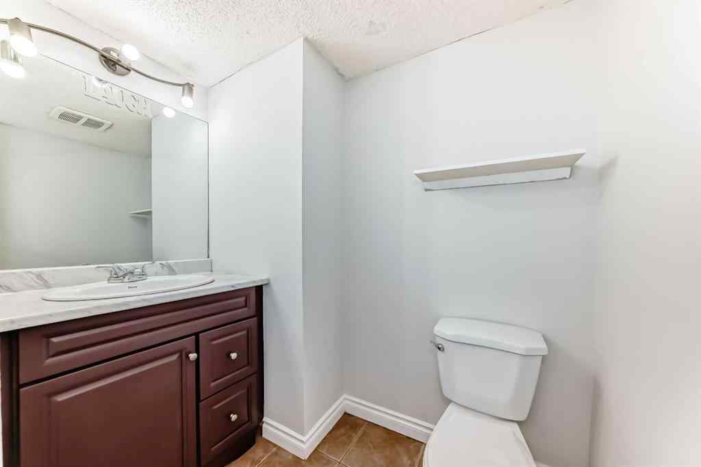 MLS® A2239315 - Unit #100 6103 Madigan Drive NE in Marlborough Park Calgary, Residential