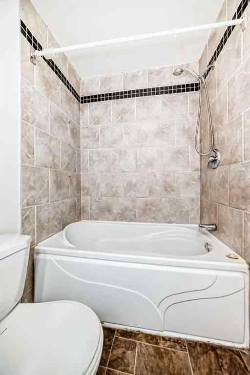 MLS® A2239315 - Unit #100 6103 Madigan Drive NE in Marlborough Park Calgary, Residential