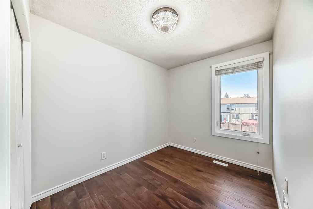 MLS® A2239315 - Unit #100 6103 Madigan Drive NE in Marlborough Park Calgary, Residential