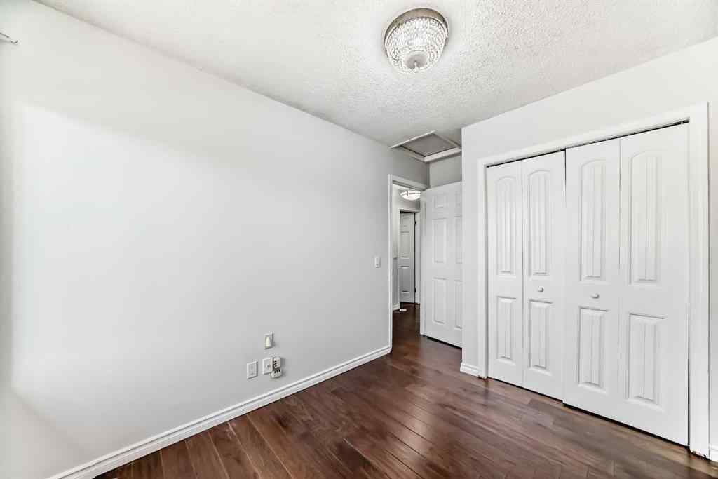 MLS® A2239315 - Unit #100 6103 Madigan Drive NE in Marlborough Park Calgary, Residential