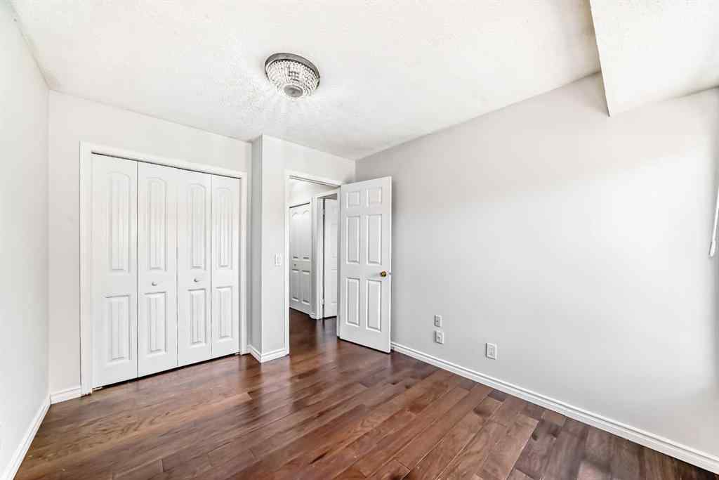 MLS® A2239315 - Unit #100 6103 Madigan Drive NE in Marlborough Park Calgary, Residential