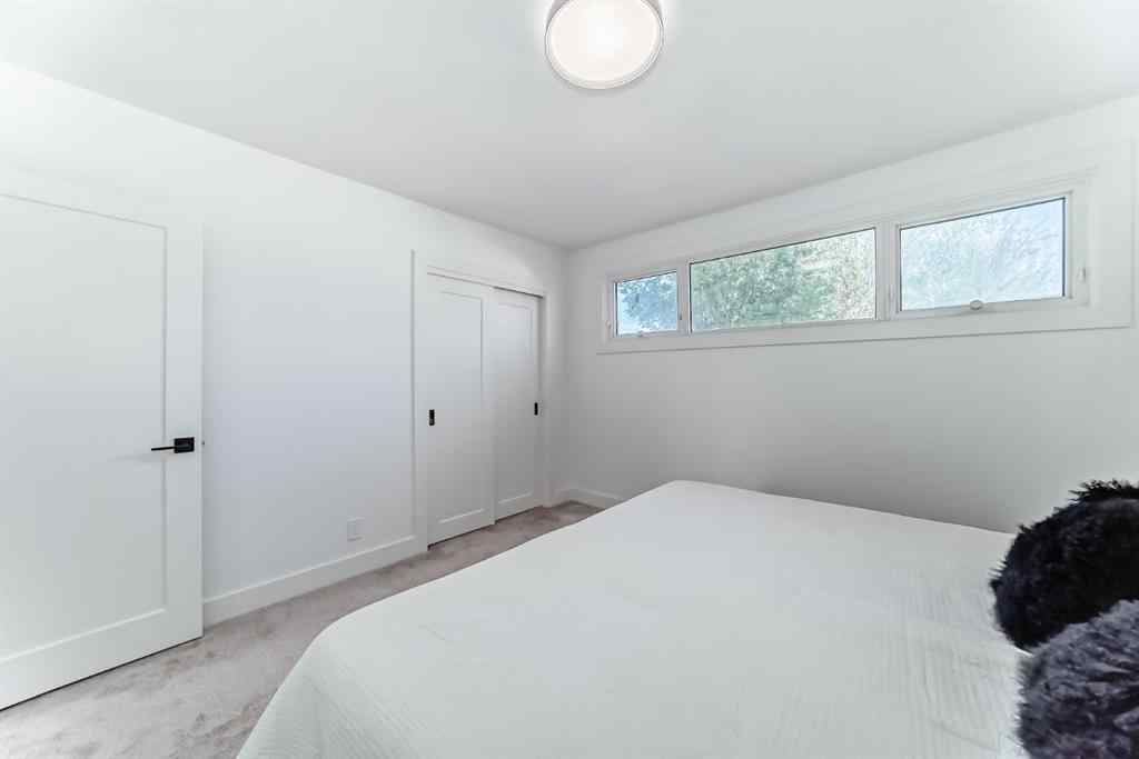MLS® A2239353 - 129 Glenpatrick Drive SW in Glenbrook Calgary, Residential