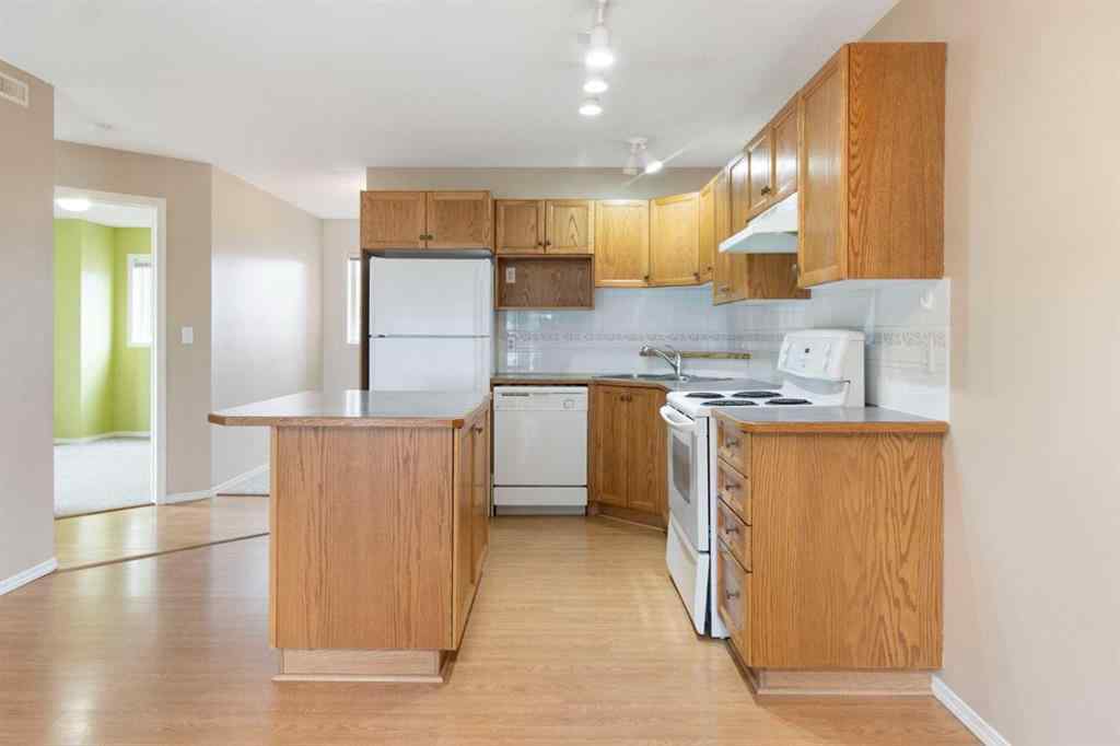 MLS® A2239355 - Unit #605 5220 50A Avenue  in Downtown Sylvan Lake, Residential