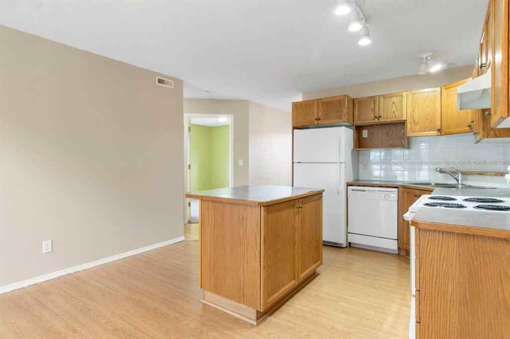 MLS® A2239355 - Unit #605 5220 50A Avenue  in Downtown Sylvan Lake, Residential