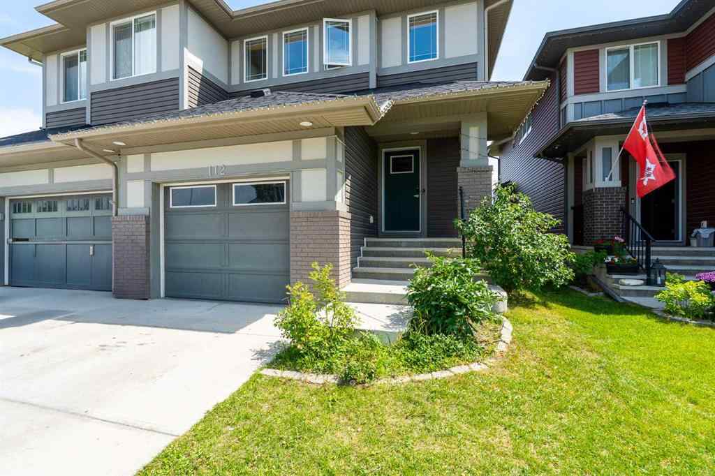 MLS® A2239365 - 112 Midtown Court SW in Midtown Airdrie, Residential