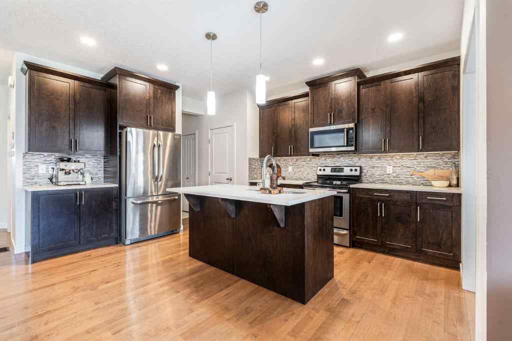 MLS® A2239365 - 112 Midtown Court SW in Midtown Airdrie, Residential